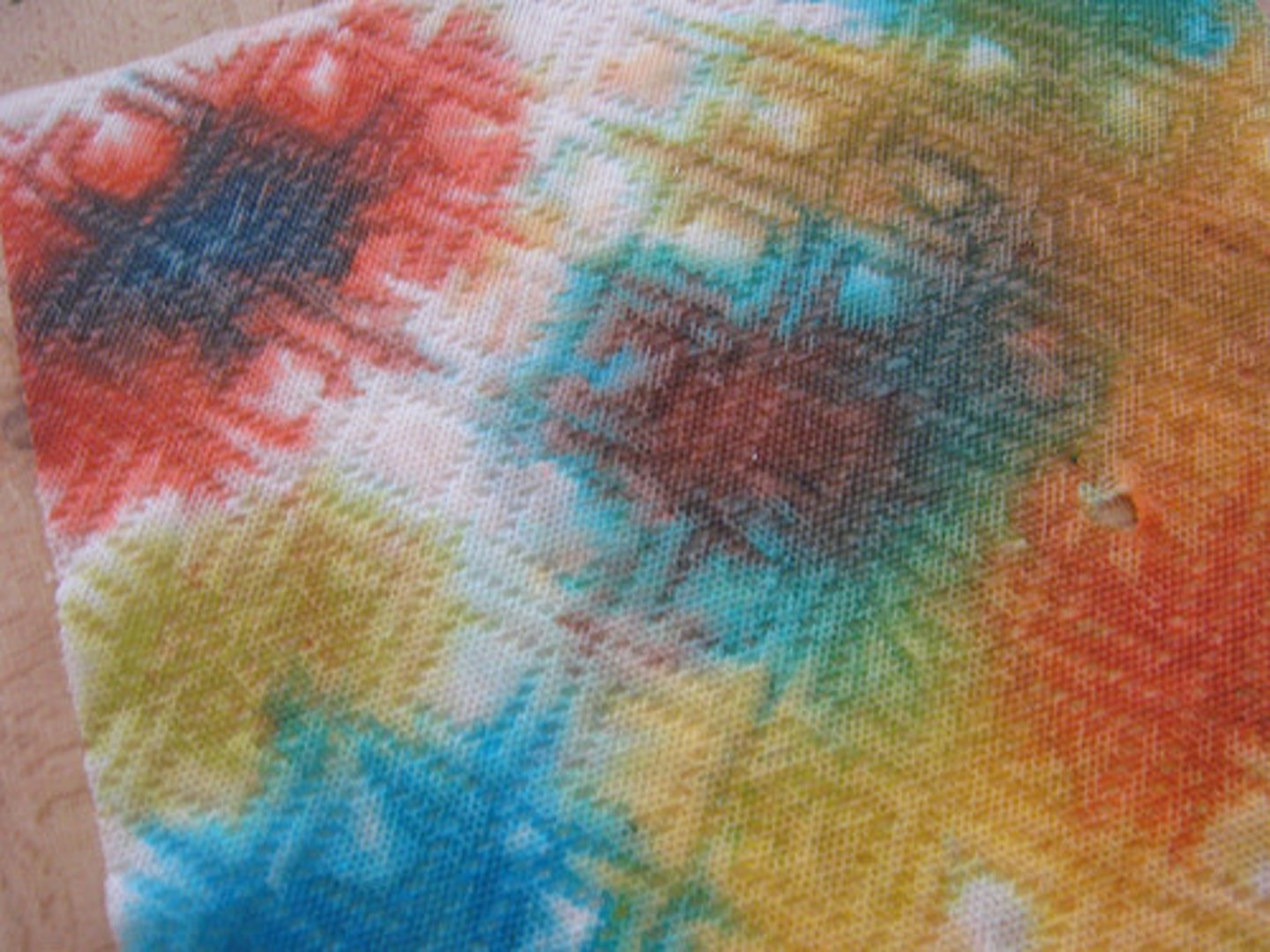 <p>(v.) To spread through, penetrate, soak through.<br><br>Picture: The food coloring permeated the paper towel.</p>