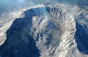 <p>What volcanic feature is shown in the picture? </p><ol><li><p>pahoehoe</p></li><li><p>rhyolite dome</p></li><li><p>lahar</p></li><li><p>fissure</p></li></ol>