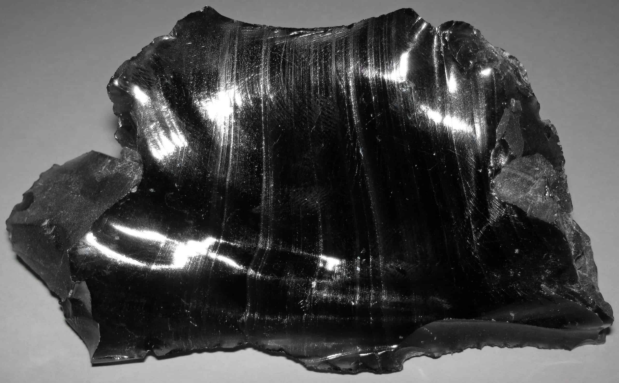 <p>Volcanic glass formed by extremely rapid cooling.</p>