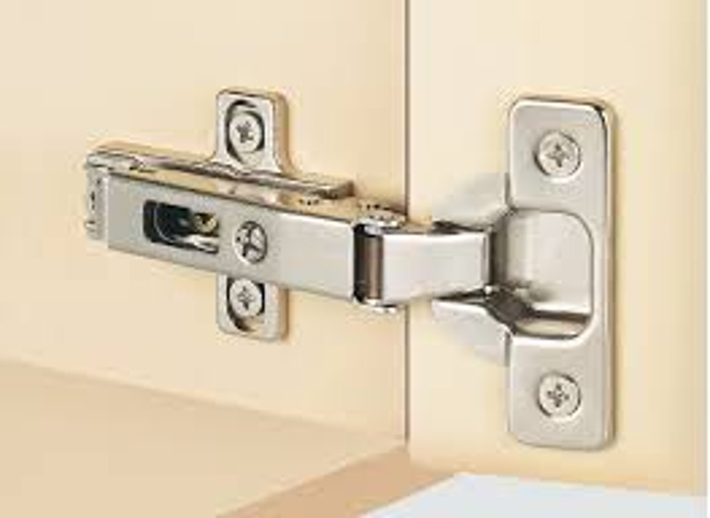 <p>a hinge attached to a frame and door from the inside, making it invisible from the outside</p>