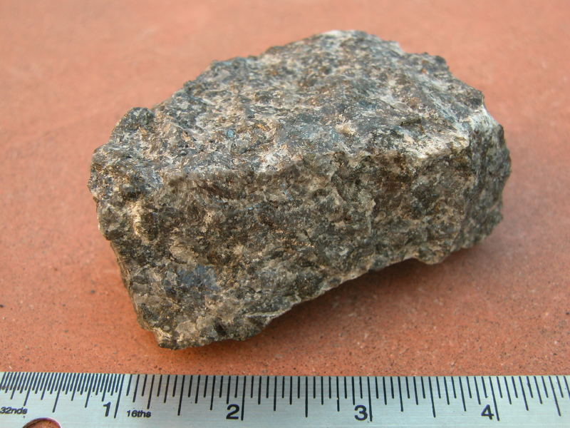 <p>Identify the igneous rock, its texture, and composition</p>