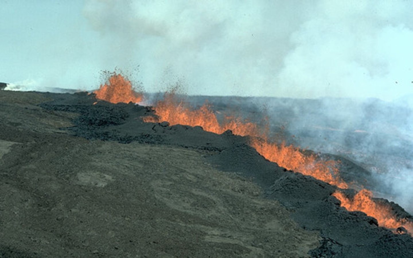 <p>a narrow opening in the Earth's crust caused by splitting (e.g. because of tectonic movement)</p>