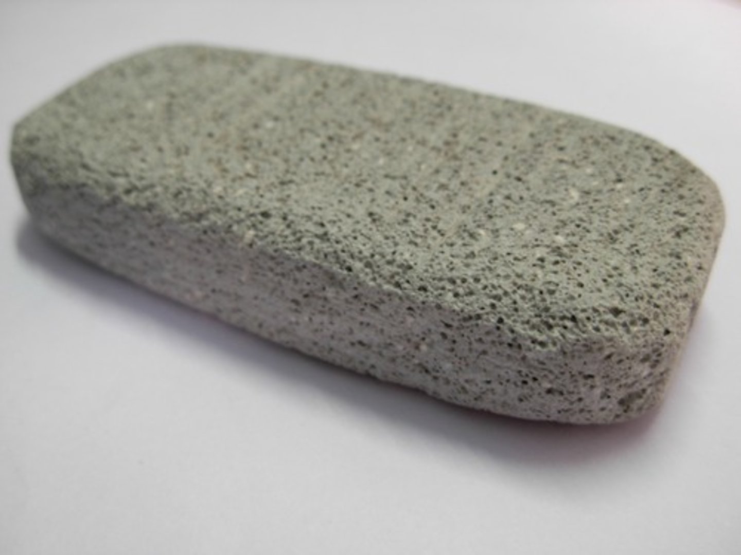 <p>Extrusive Igneous Rock</p><p>Color: light gray</p><p>Streak: Layers:</p><p>Texture: full of small similar-sized air bubbles "frothy"</p><p>Shiny: light sheen, not glossy</p><p>Hardness:</p><p>Other: used in soaps and polishes because of it's abrasive qualities</p><p>floats in water,very light</p><p>formed from lava that cools quickly, trapping air bubbles inside</p>