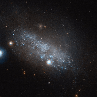 <p>lacks distinct shape, spiral arm, chaotic appearance</p>