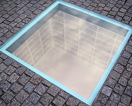 <p>The Empty Library (1995) by Micha Ullman</p>