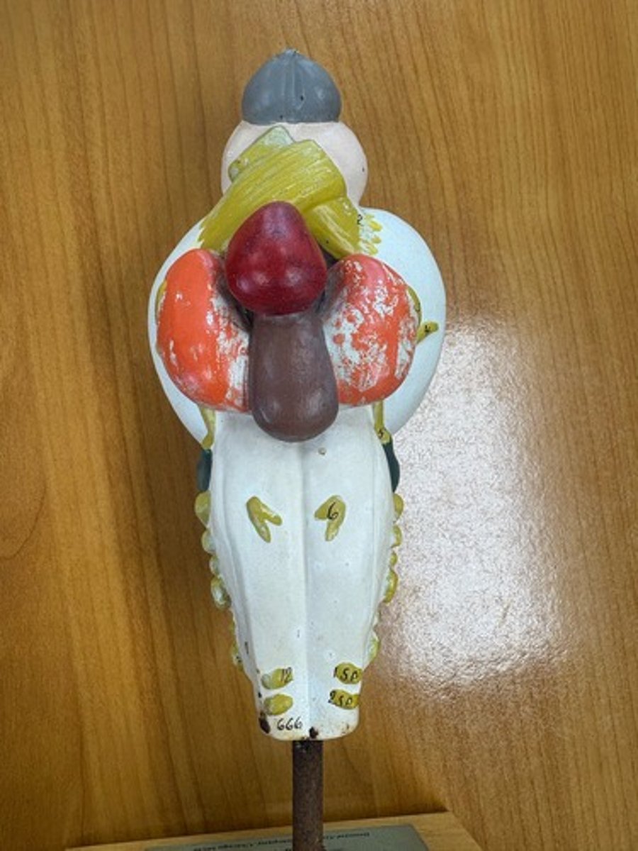 <p>White underneath orange structure and animal</p>