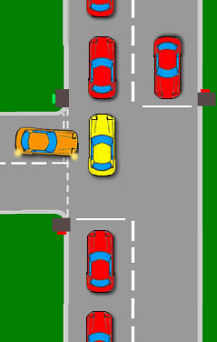 <p>Stay out of the intersection until traffic clears.</p>