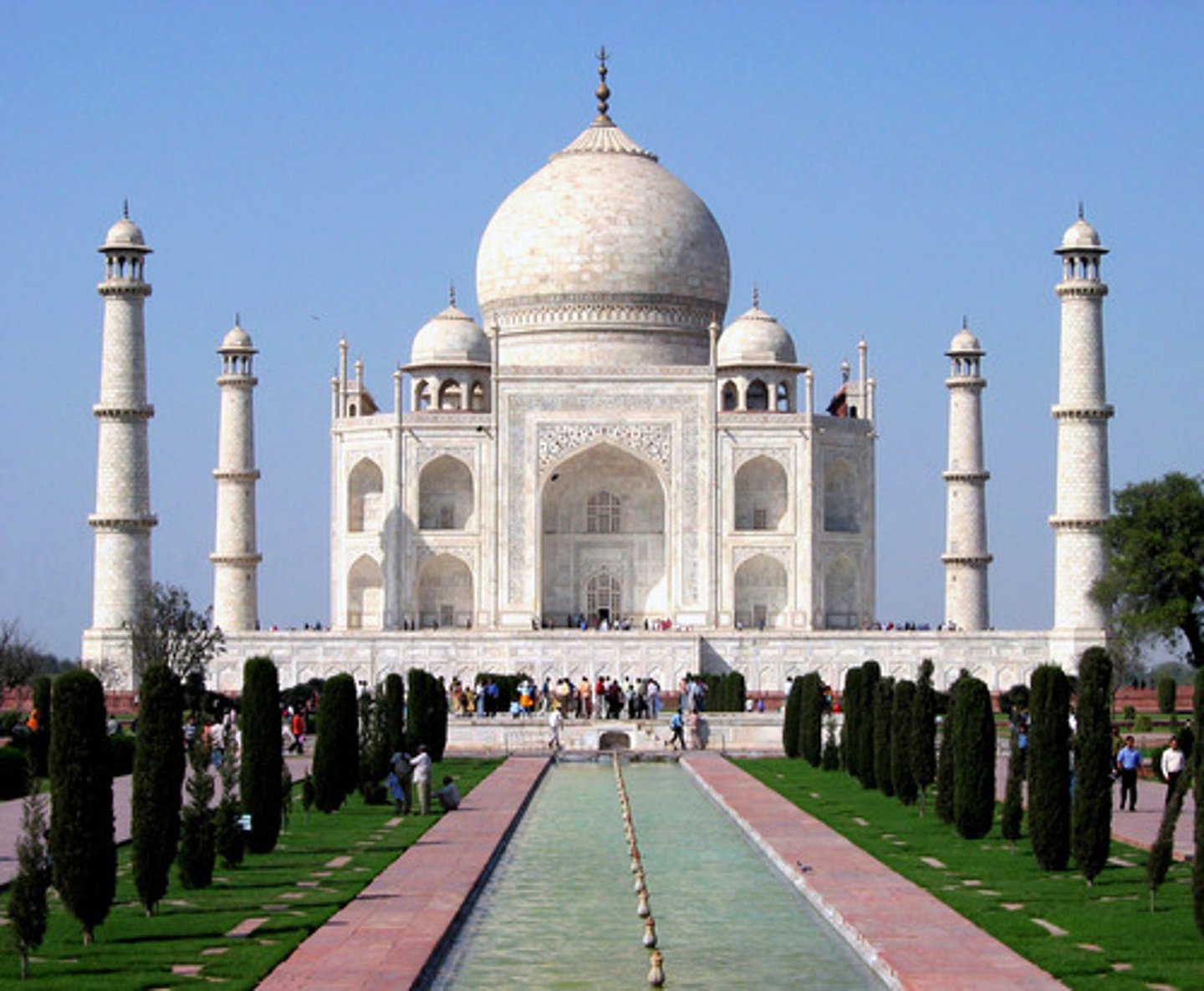 <p>-Mausoleum for the wife of Shah Jahan</p><p>-Facade made of limestone</p><p>-Pointed arch: begins with a bulb but then comes inward has a curved and a counter curve, more curvilinear, less structural and filled with light and air</p><p>-Domes: curves followed by a counter-curve (look like bulbs)</p><p>-Minarets</p><p>-Islamic Art</p>