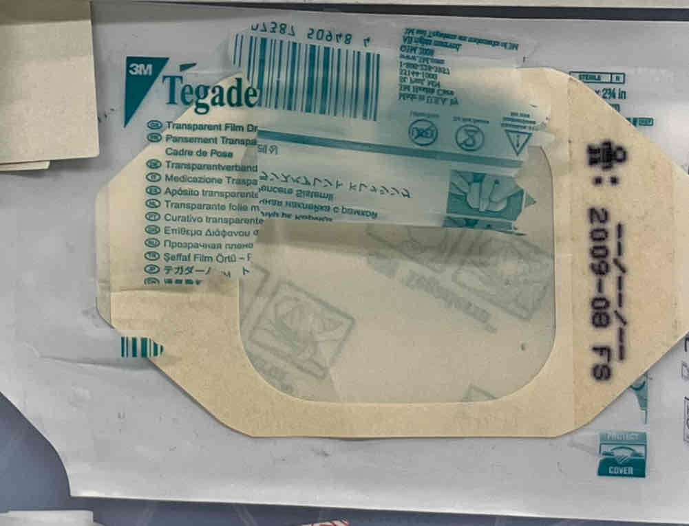 <p>Transparent adhesive dressing, frequently used by anesthesia to cover IV lines (thin)</p>