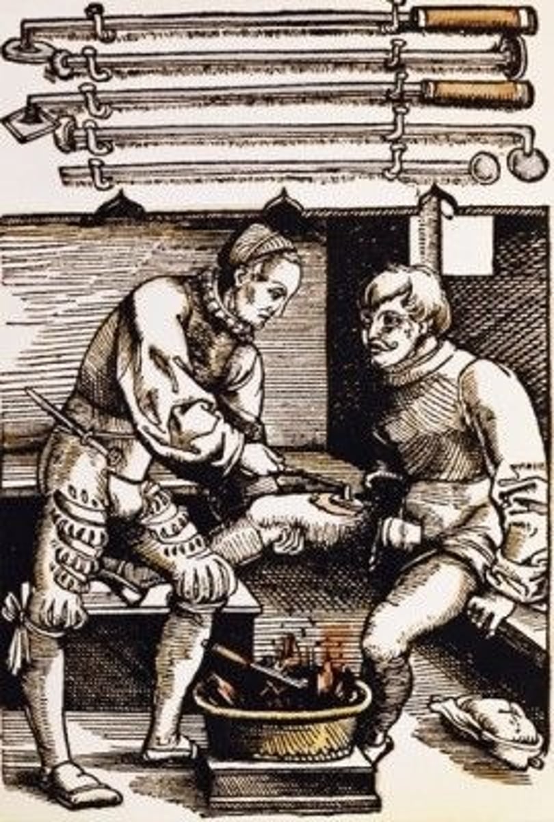 <p>Using hot iron pressed against a wounded area to seal the wound through burning the flesh dry</p>