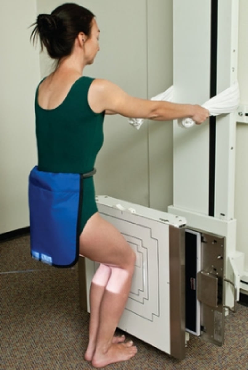 <p>CR angled 10 degrees caudad </p><p>centered directly to midpoint between knee joints at level 1/2 inch below apex of patella</p>