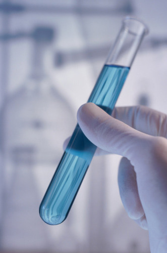 An experiment that takes place in a controlled environment where the researcher manipulates the IV and records the effect on the DV while maintaining strict control of extraneous variables.