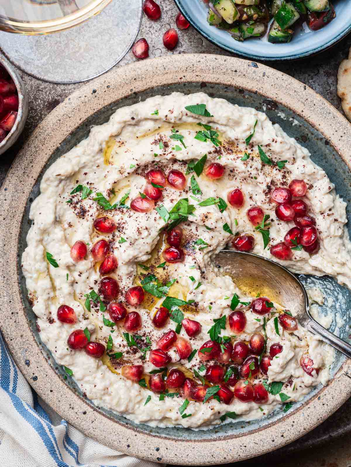 <p>mutabbal (eggplant dip with tahini, garlic and lemon juice so creamier and more tangy than baba ghanoush) </p>