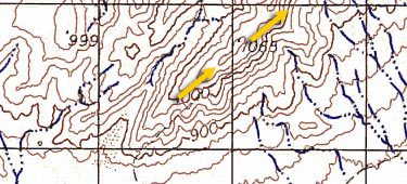 <p>A sloping line of high ground that, in the center, has low ground in three directions and high ground in one. Contour lines form a U or V shape with the closed ends pointing away from high ground.</p>