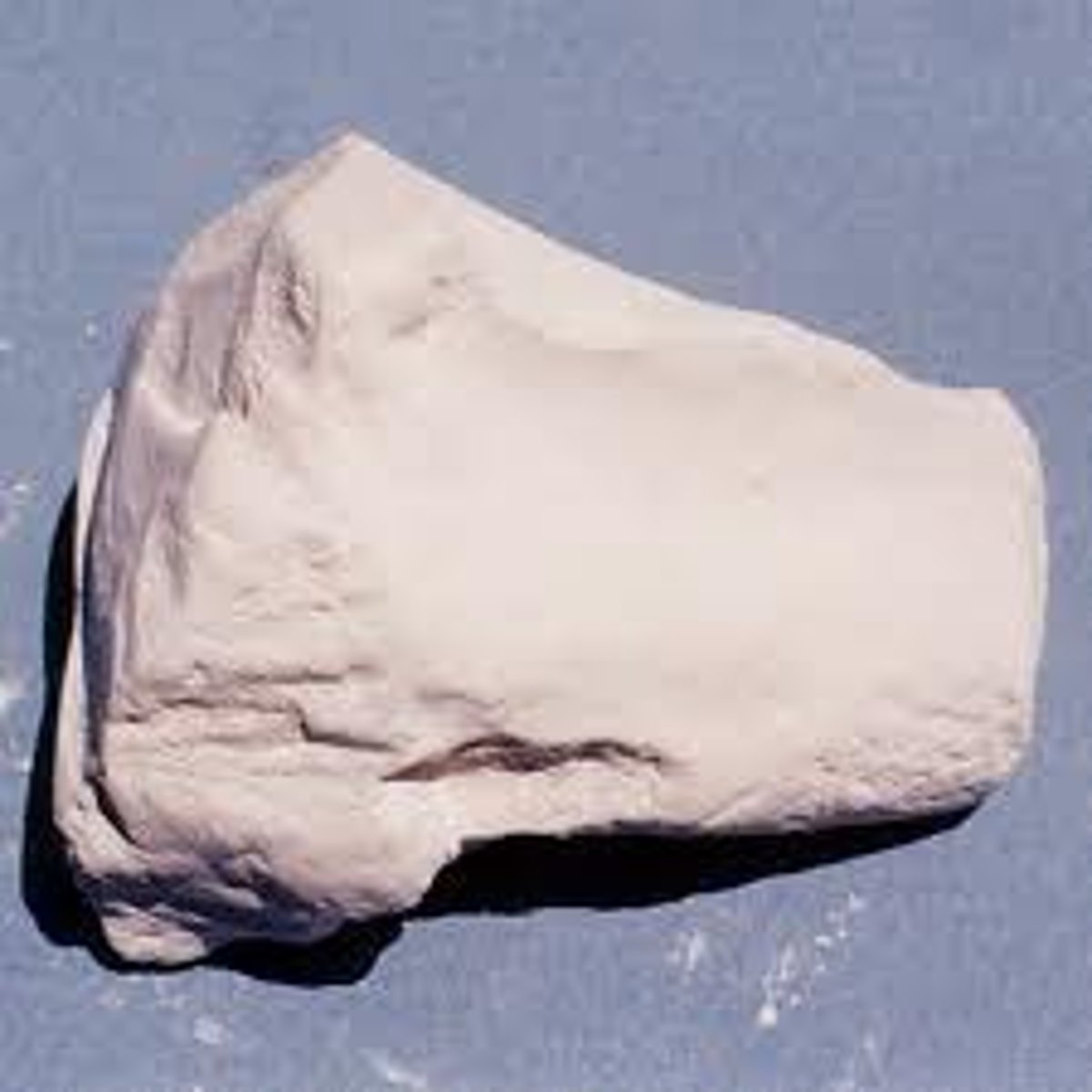 <p>Not reflecting significant amount of light or play of color (kaolinite, some hematite)</p>