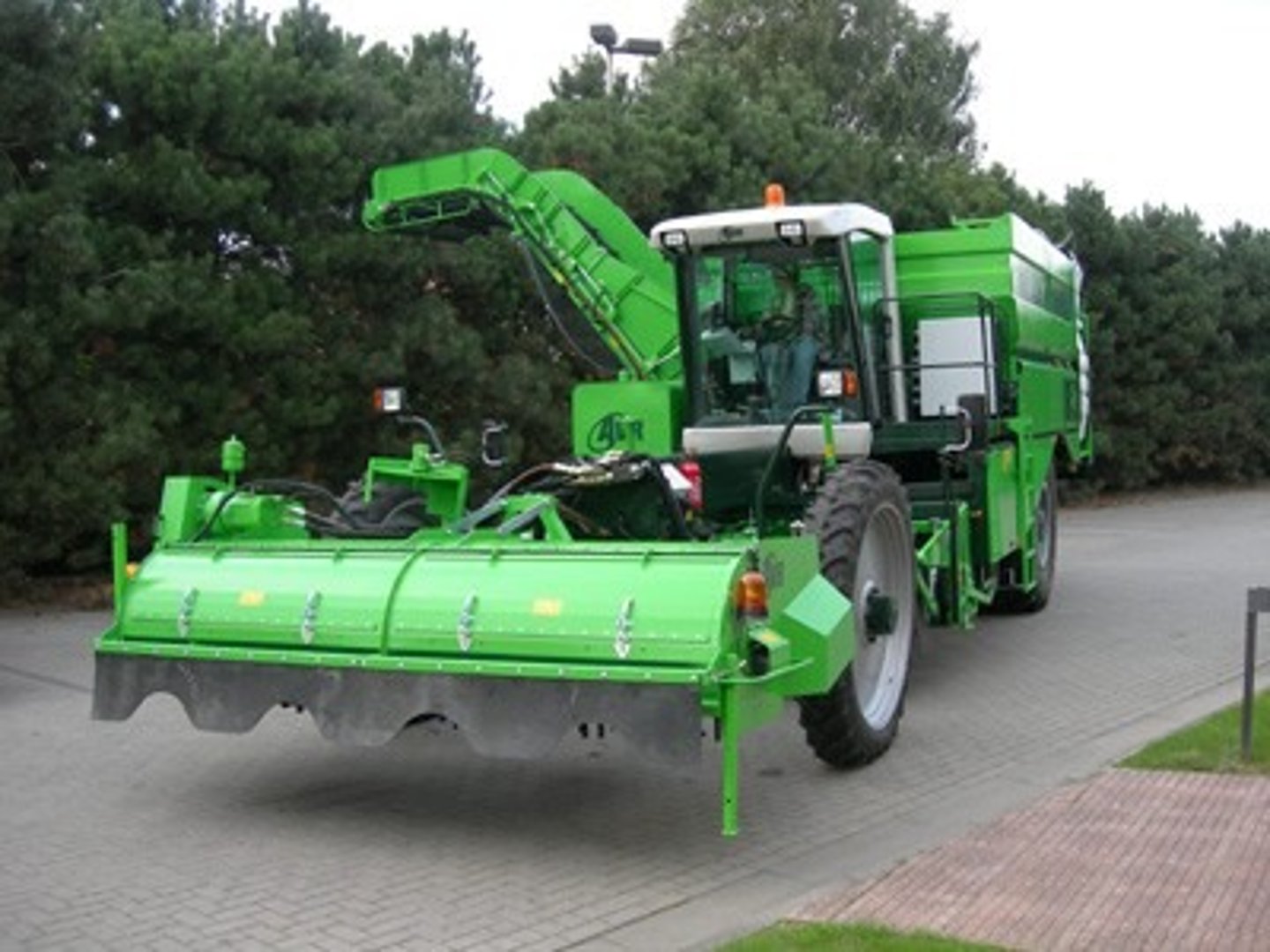 <p>machines that harvest potatoes. They work by lifting the potatoes from the bed using a share. Soil and crop are transferred onto a series of webs where the loose soil is sieved out</p>