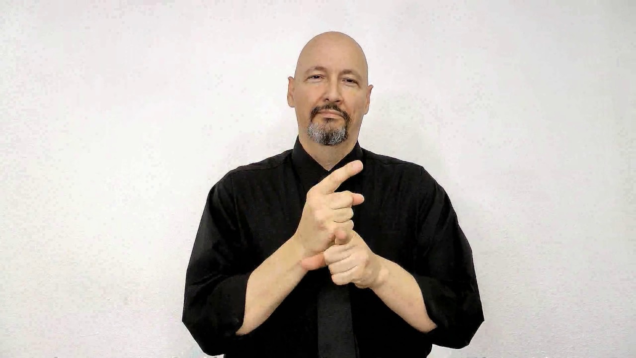 <p>Left hand taps on right hand once</p>