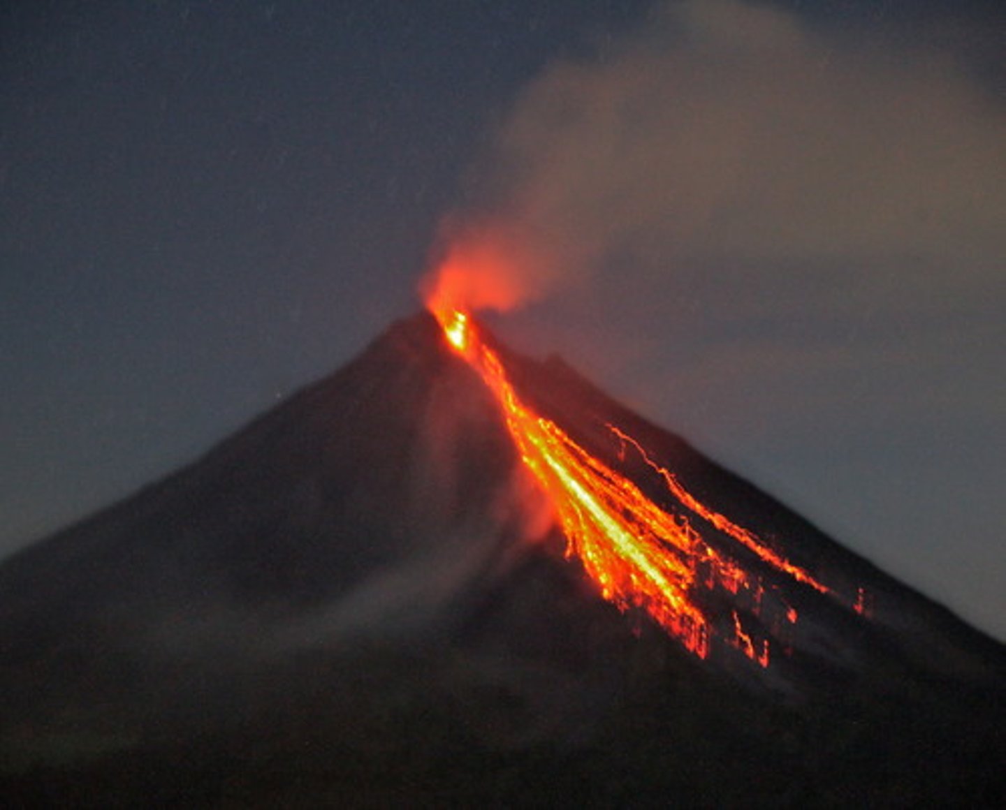 <p>Hot, melted rock material that reaches the Earth's SURFACE.</p>