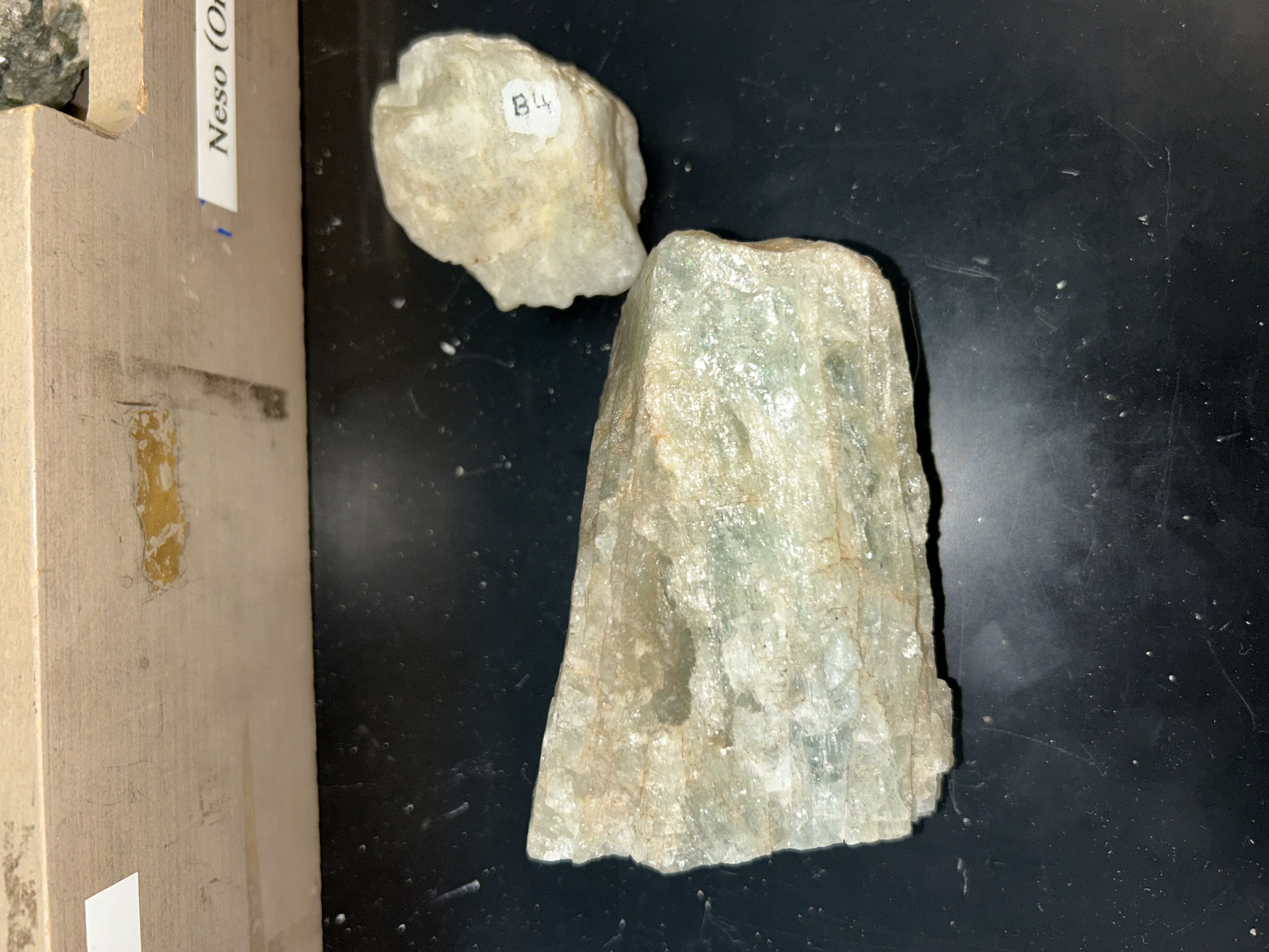 <p>7.5 hardness </p><p>range of colors- greenish in this sample </p><p>hexagonal crystal</p>