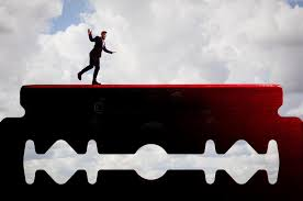 <p><strong>in a difficult or worrying situation for which the result is very uncertain:</strong></p><ul><li><p><span><em><span>Life for them has always been _ of survival.</span></em></span></p></li><li><p><span><em><span>Approval of the peace accord is _ in the 120-member parliament.</span></em></span></p></li></ul><p>→ <span><span>Ngàn cân treo sợi tóc.</span></span></p>