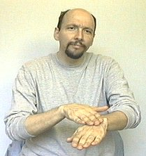 <p><span style="font-size: medium">slide the dominant hand (right hand if you are right handed) up the non-dominant forearm a short distance--starting at the back of the base (left) hand. You only need to go a few inches.</span></p>