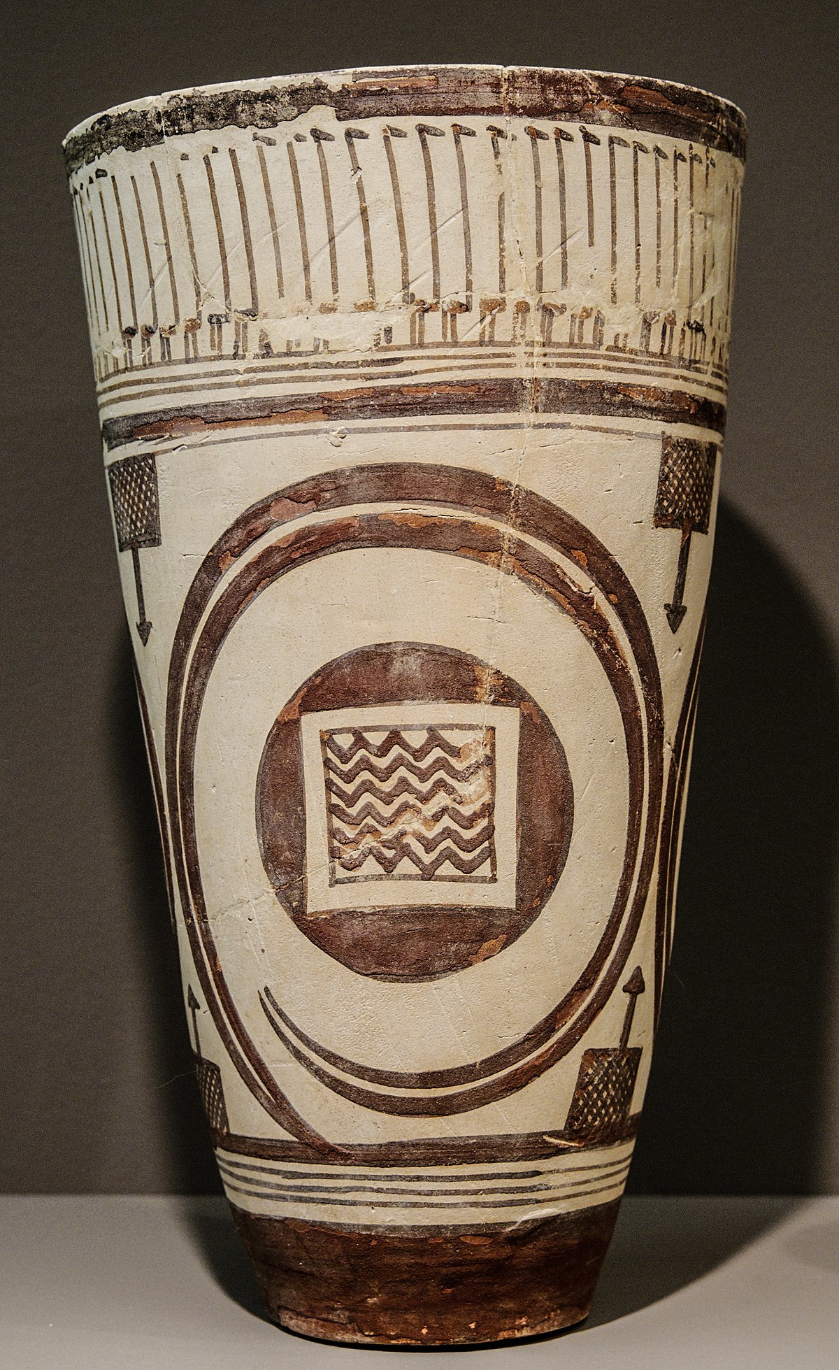 <p>It is a beaker that has ibex motifs on it. The ibex is a type of wild goat that was often depicted in ancient art. This beaker was likely used for drinking or storing liquids. It was made by skilled artisans in ancient times and is now a valuable artifact for archaeologists to study.</p>