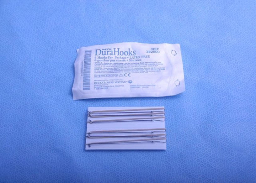<p>retract dura during a craniotomy, hooks attach to dura and are held in place by calming rubber band end to drapes with a kelly, allows dura to be held back without doubling back on itself-thus making replacement at end of the case easier </p>