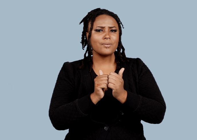 <p>Rub left fingers against right hand while furrowing your eyebrows</p>