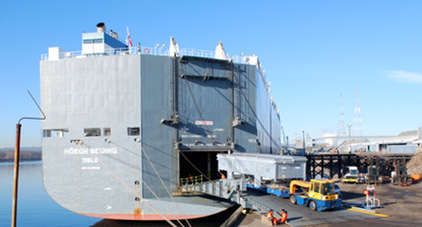 <p>a place where cargo is unloaded from one form of transportation and pieces of it are sent out in different directions to other forms</p>