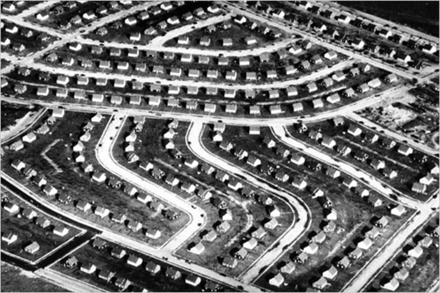 <p>In 1947, William Levitt used mass production techniques to build inexpensive homes in suburban New York to help relieve the postwar housing shortage. Became a symbol of the movement to the suburbs in the years after WWII</p>