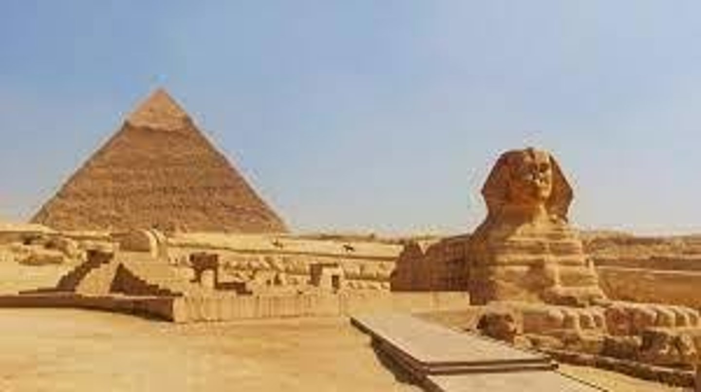 <p>(Giza, Egypt. Old Kingdom, c. 2550–2490 BCE. Cut limestone)</p><p>Content: Three pyramids for pharaohs Khufu, Khafre, Menkaure; mortuary temples nearby; Sphinx carved with lion’s body and Khafre’s head.</p><p>Form: Monumental limestone blocks; perfect geometric pyramid shape; originally sheathed in white casing stone; precise alignment to cardinal points.</p><p>Function: Royal tombs; monuments to pharaohs’ divine power; ensured safe journey to afterlife.</p><p>Context: Built during Old Kingdom “Age of Pyramids”; extraordinary organization of labor and resources; Sphinx symbolized royal power and sun god.</p>