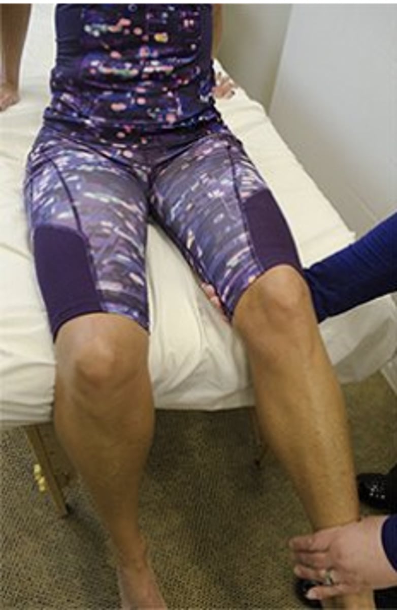 <p>The quadriceps group is being tested in the photograph (Hislop, p. 248). This option is correct because maximum torque of the knee extensors reaches a peak at about 60° of knee flexion and decreases with further extension of the knee. Stepping up on a curb requires a greater workload for the quadriceps muscle group, compared to the other activities listed. (Houglum, p. 460). </p><p>Walking on a level surface requires less quadriceps work than stepping up on a curb because maximum torque of the knee extensors reaches a peak at about 60° of knee flexion and decreases with further extension of the knee (Houglum, p. 460). The quadriceps group is being tested in the photograph (Hislop, p. 248). </p><p>With the femur fixed, the hip flexors will flex the trunk forward. Although the rectus femoris is a hip flexor and knee extensor, weakness of the rectus femoris can be compensated for in this action by other hip flexors such as the iliopsoas. (Loudon, p. 270)</p>