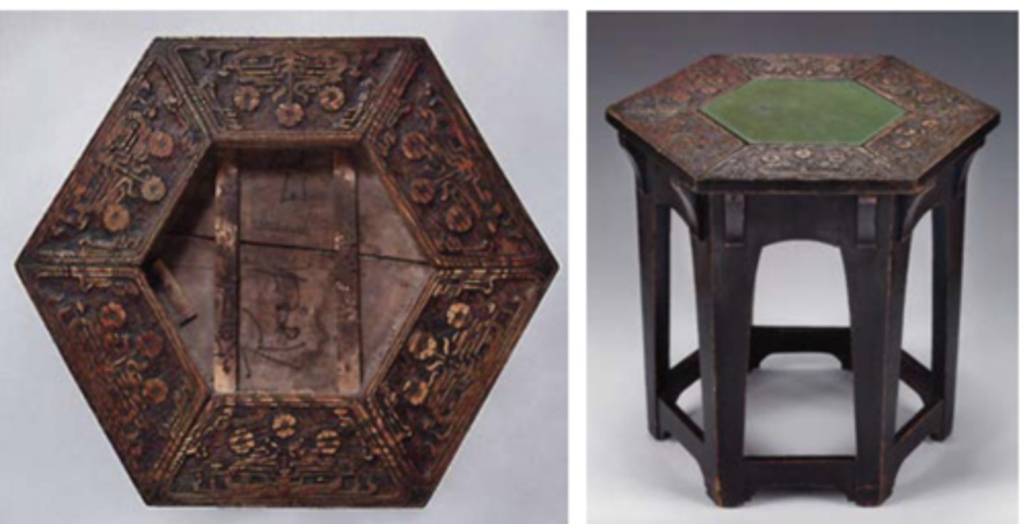 <p>Gustav Stickley<br>Plant stand with tile top to protect from water damage. Color was chosen for contrast,<br>Surface work: fine writing, stencil, chisel, pyrographic point</p>