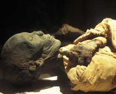 embalmment and drying a dead body and wrapping it as a mummy