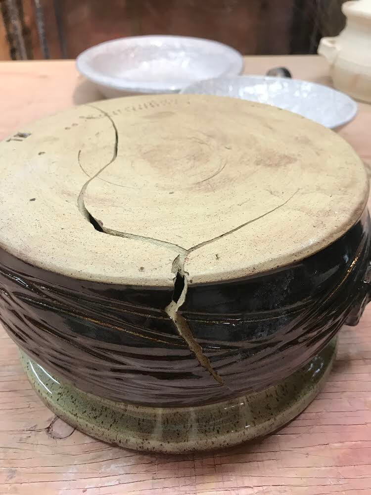 <p>cracking that occurs in a fired ware as a result of thermal stresses</p><ul><li><p>More specifically, cracking that occurs if a ware is cooled too rapidly or that appears on refiring bisque ware through 400 - 600°C, with the expansion of quartz.</p></li></ul><p></p>