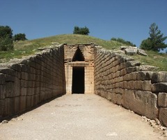 <p>a roof made of stone slabs that progressively overlap to create a door opening</p>