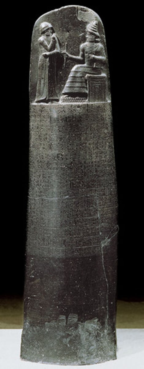 <p>Form:</p><p>-black-stone stele with words carved in it</p><p>-basalt</p><p>-frontal shoulders, everything else profile</p><p>Content:</p><p>-divine law code carved in stone</p><p>-sun god, Shamash, giving laws to Hammurabi to be king</p><p>-god is bigger (hierarchic scale)</p><p>Function:</p><p>-tells us where the laws came from</p><p>-exercises justice and divine authority to carry out the law</p><p>Context:</p><p>- Babylon (modern day Iran)</p><p>-Susian (1760-1750 BCE)</p>