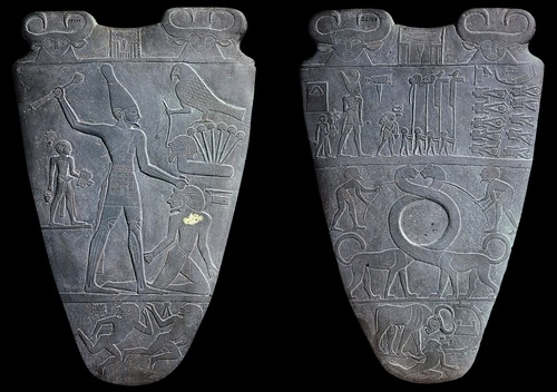 Predynastic Egypt. c. 3000-2920 B.C.E. Greywacke

First example of both crowns worn by one king to symbolize unification of Egypt

Narmer in smiting pose with Horus above impotent foe