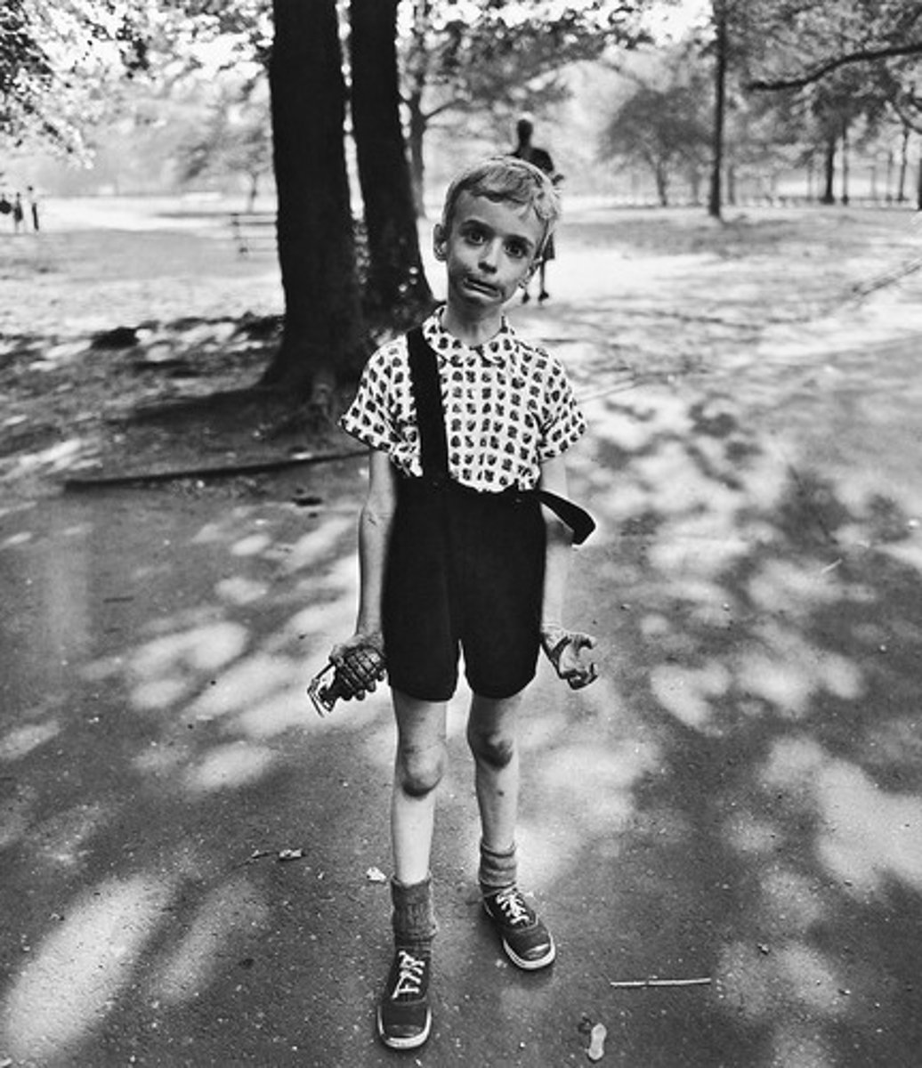 <p>Black and White Portraits</p><p>Mostly Square</p><p>Took photos of "ugly" people (Transgender, Deformed, Dwarf, Giant, Circus)</p><p>Famous: Grenade Boy, Twins</p><p>Late '60s to '70s in NYC</p><p>Photos of sex and nudists</p>