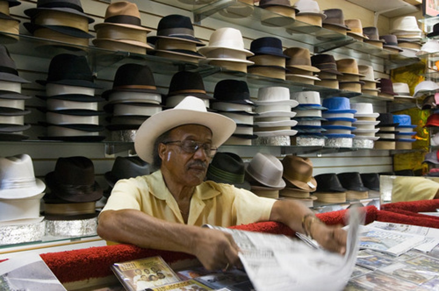 <p>The customer was being helped by the salesman when the thief came into the store.</p>