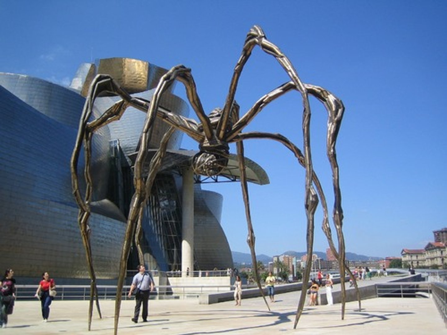 <p>A massive, nine-meter-tall spider sculpture, representing both the protection and menace of a mother figure, reflecting her complex, personal mythology.</p>