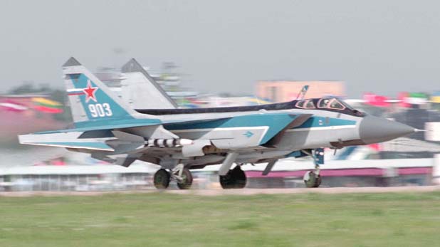 <p>FOXHOUND, MiG-31, МиГ-31 (Tandem seat, sloped intakes, exhaust obtrudes past vertical stablisers, Long pointed nose)</p>