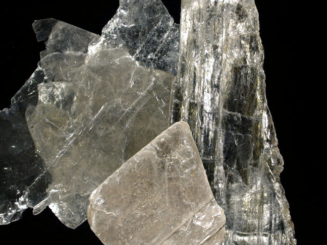 <p>colorless, transparent, 2-2.25 hardness, pearly luster</p>