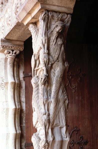 <p>Priory Church of St. Pierre, Moissac, France; South Portal c. 1115; central post between doorways; decorated on three of four sides.; on the front, there are three pairs of intertwined lions and lionesses who symbolically guard the entrance; Romanesque art</p>