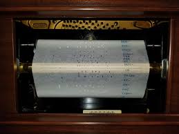 <p>For player pianos</p><p>Holes punched in paper tells piano which notes to play</p>