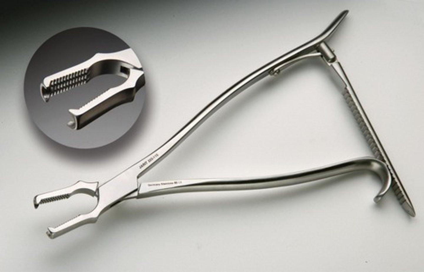 <p>heavy duty, self retaining forceps used to hold bone during surgery</p>