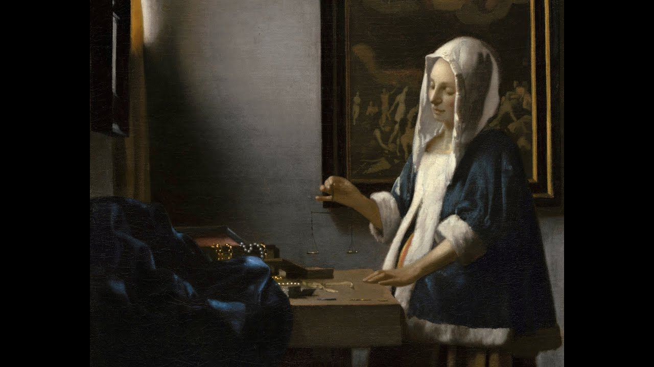 <p>Woman Holding a Balance, Johannes Vermeer</p>