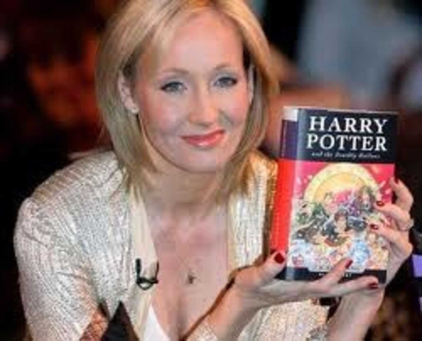 <p>n ______<br>someone who writes books, stories, etc <br><br>My favourite ______ is J. K. Rowling.</p>