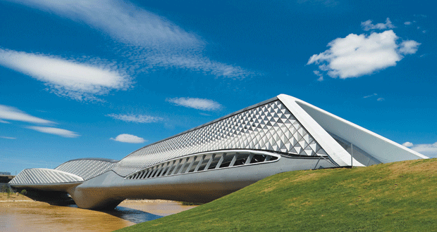 <p>built in 2008, doubles as a pedestrian bridge across the Ebro River in Zaragoza, Spain. The building&apos;s exterior, comprising 29,000 triangles, is composed of fiberglass-reinforced concrete.</p>
