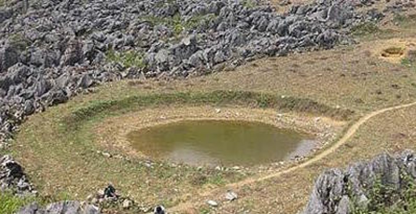 <p>occurs when the rate of withdrawl is faster than the rate of recharge</p><p>- can cause spring-fed streams to dry up as the water table drops farther from ground surface</p>